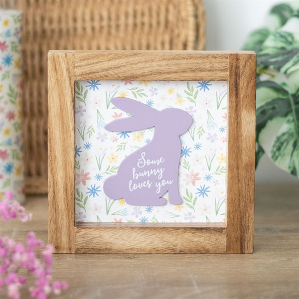 Wooden frame sign with purple rabbit silhouette and ‘Some Bunny Loves You’ text on floral background – Panache Homeware Kitchen Collection, cute Easter wall decor, perfect gift.
