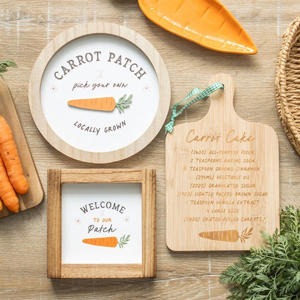 Wooden cutting board with engraved carrot cake recipe and decorative carrot design – Panache Homeware Kitchen Collection, rustic cottagecore kitchen gift.