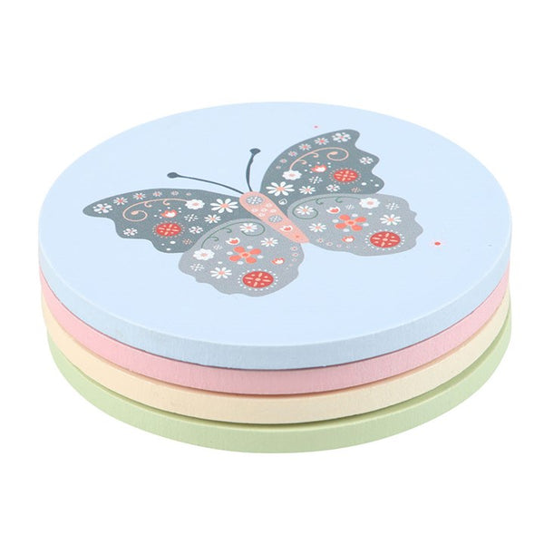 Stack of three colorful round containers with butterfly design on a white background