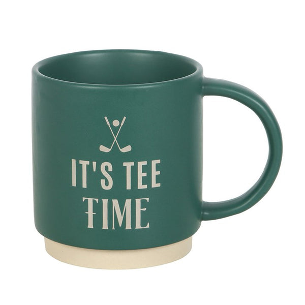 Green mug with 'It's Tee Time' text and golf club symbol on a white background