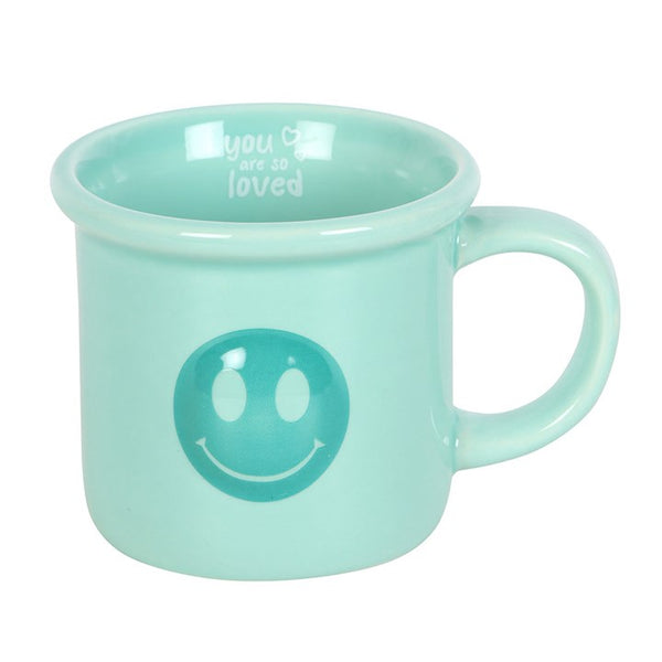 Light blue ceramic mug with smiley face design – Panache Homeware Kitchen Collection, cute positive coffee cup.