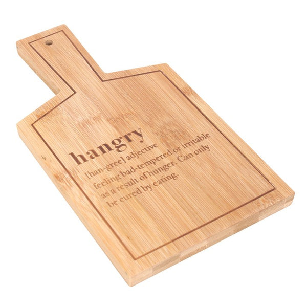 Wooden cutting board with engraved definition of 'hangry' on a white background