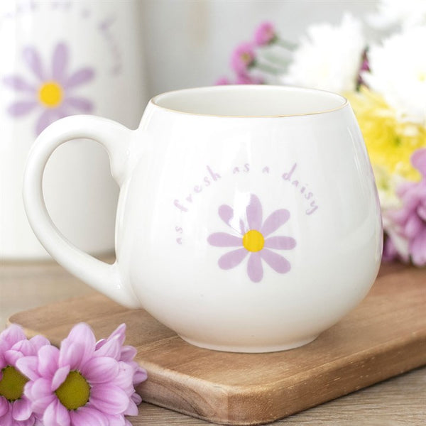 White ceramic mug with floral design and ‘As Fresh As A Daisy’ text – Panache Homeware Kitchen Collection, cute cottagecore coffee cup gift.