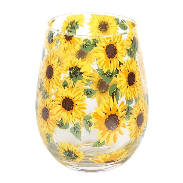 Glass with sunflower design on a white background