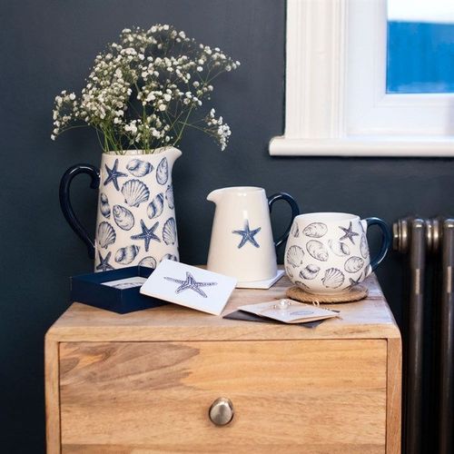 17cm seashell ceramic flower jug with shell and starfish patterns – Panache Homeware Kitchen Collection, coastal cottagecore vase, perfect gift.