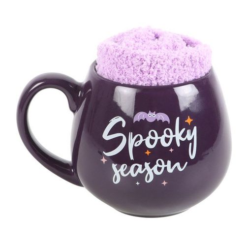 Purple ceramic mug with ‘Spooky Season’ text and bat silhouette, filled with fluffy purple socks – Panache Homeware Kitchen Collection, cute Halloween gift set.