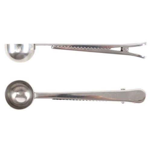 Two metal ice cream scoops on a white background